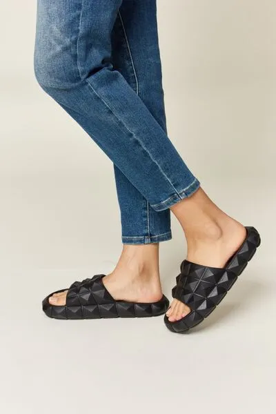 Black Pyramid Stud Toe Band Footbed Sandals