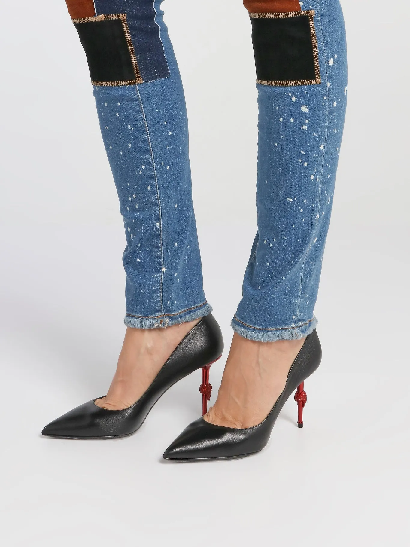 Black Skull Mid-Heel Pumps
