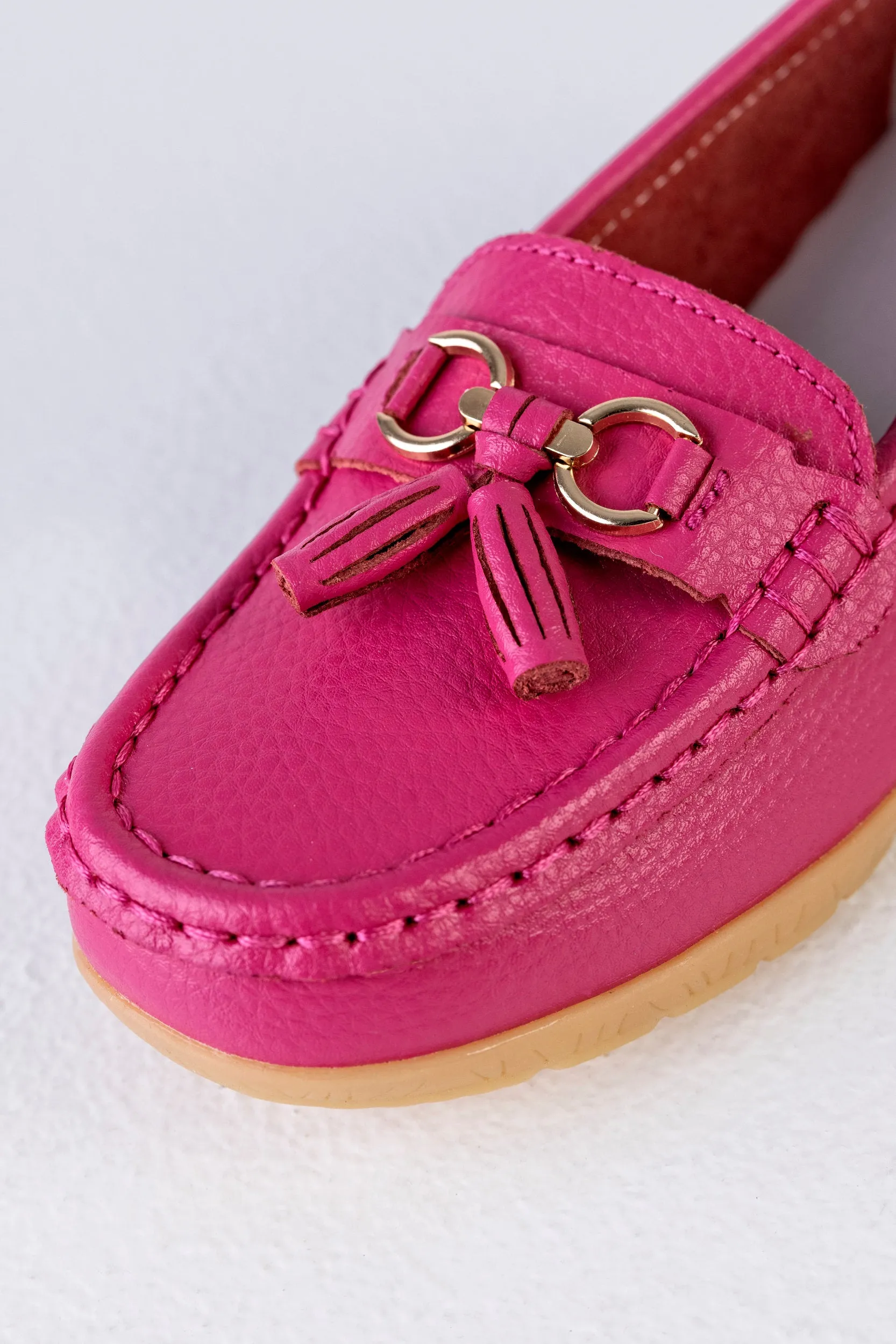 Leather moccasins with tassels