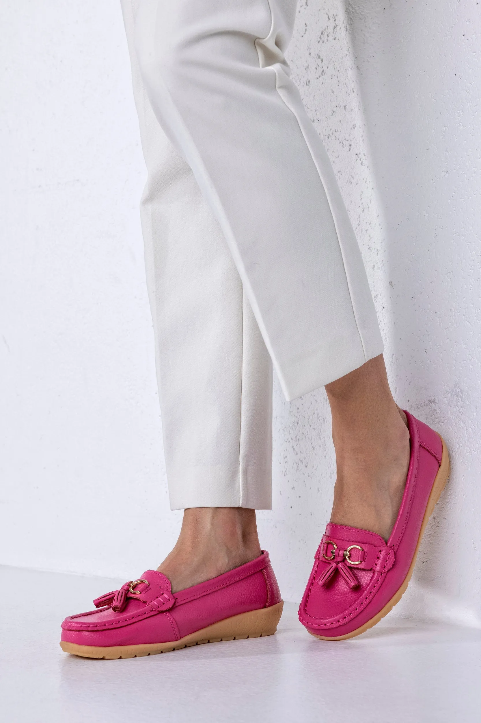 Leather moccasins with tassels