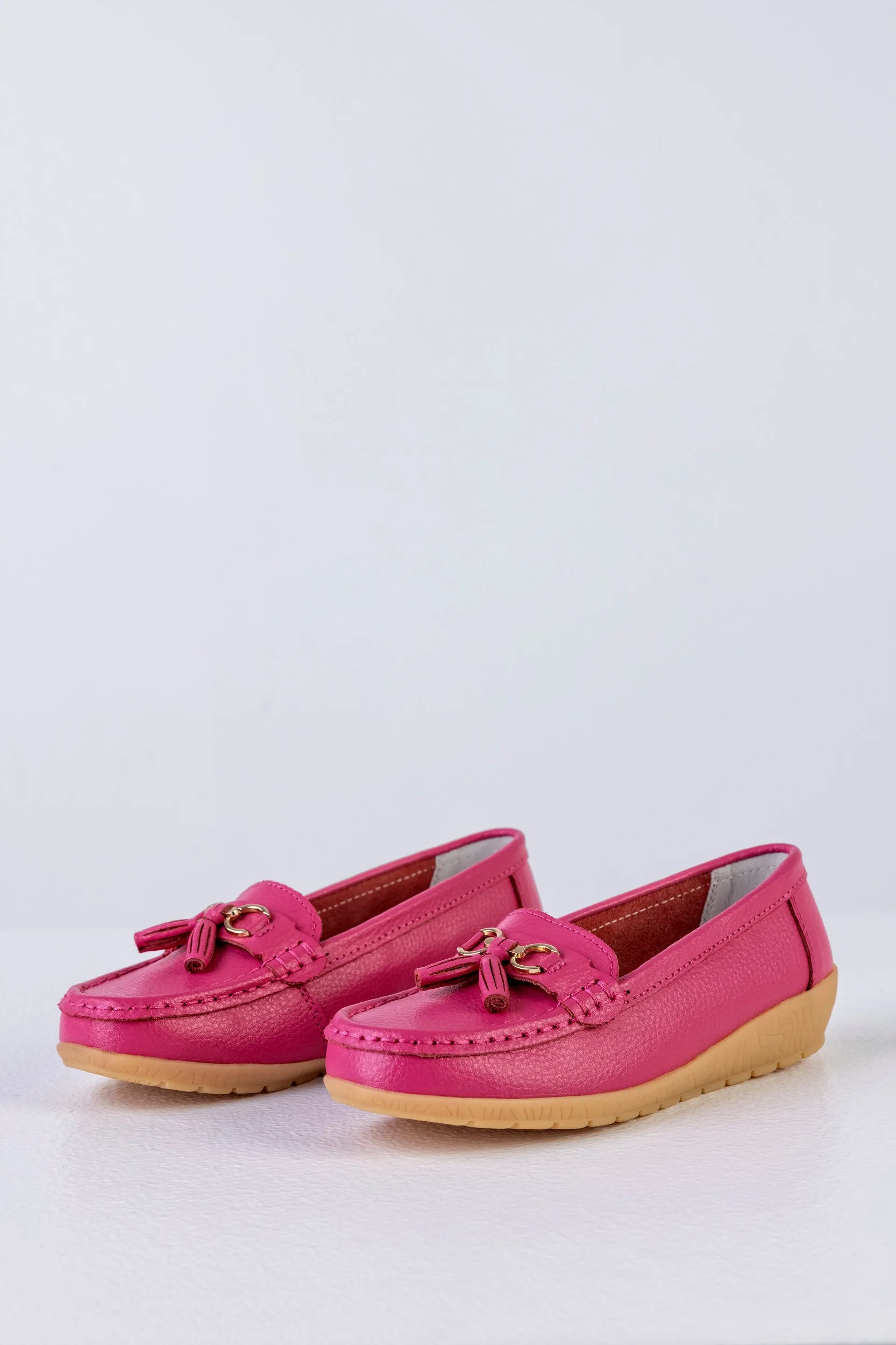 Leather moccasins with tassels