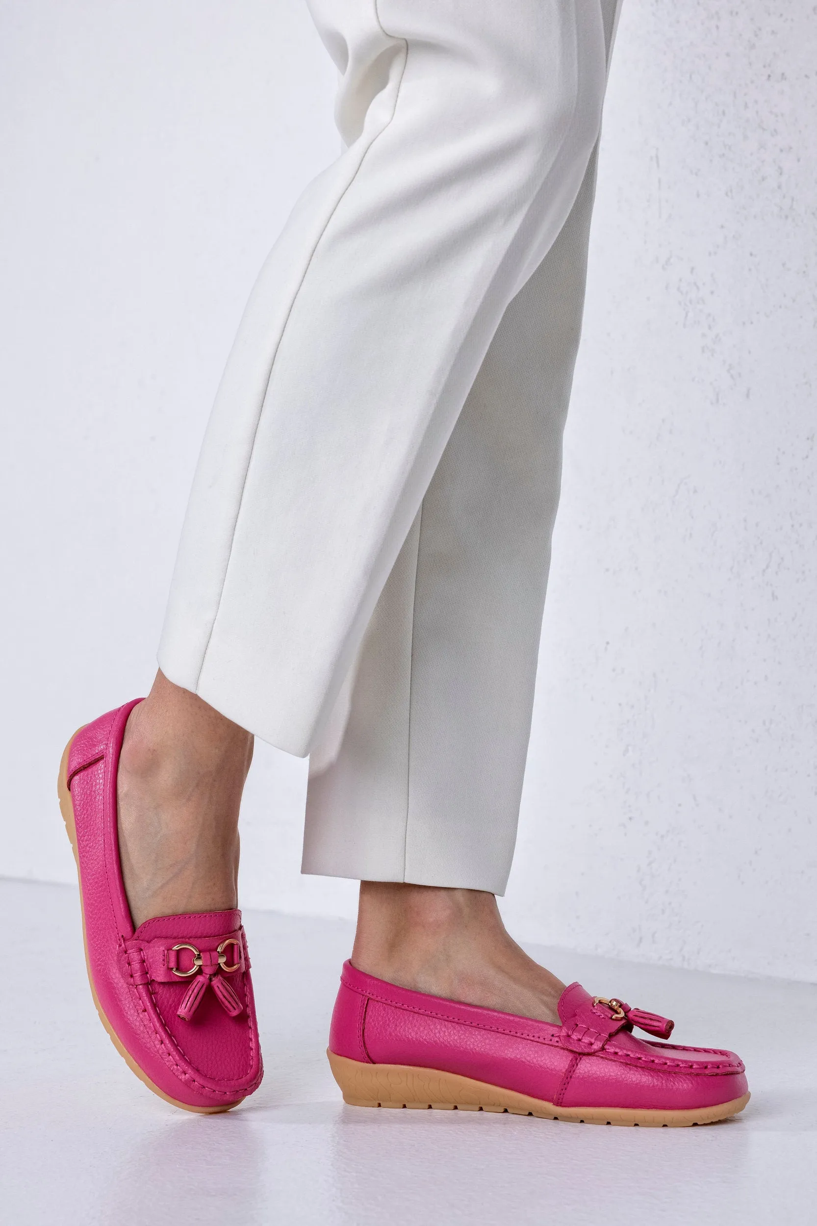 Leather moccasins with tassels