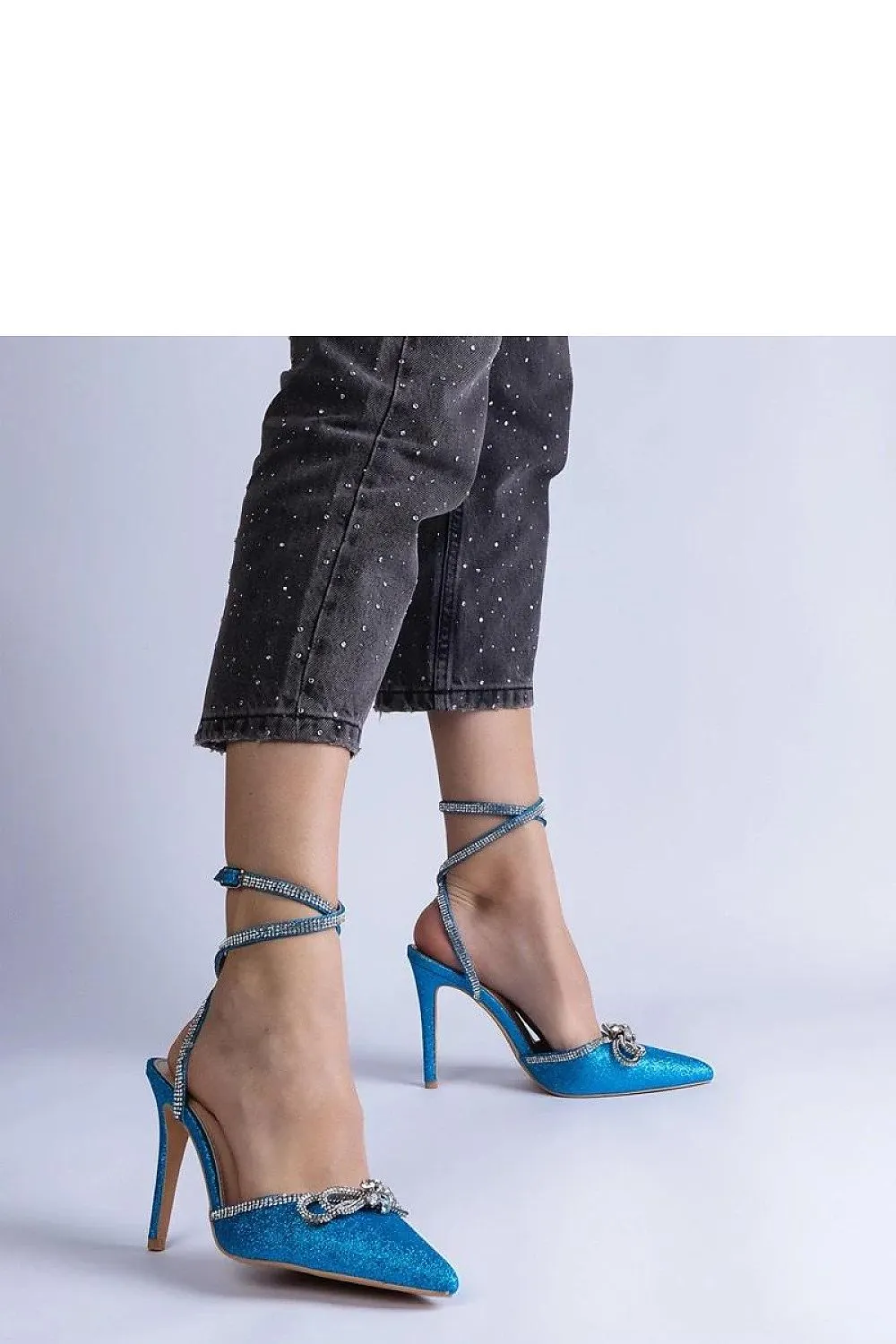 Pink brocade high heels with a bow
