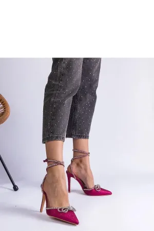 Pink brocade high heels with a bow